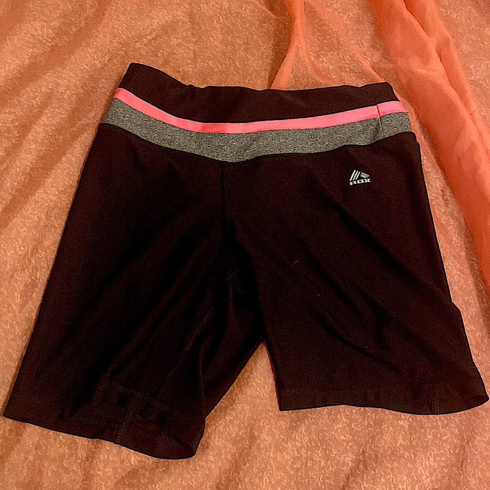 I’m selling a RBX shorts, they are small. 88% polyester and 12% spandex,no iron.
